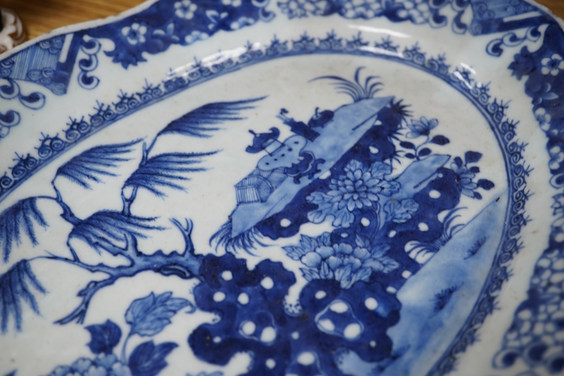 Two 18th century Chinese blue and white dishes, largest 31cm